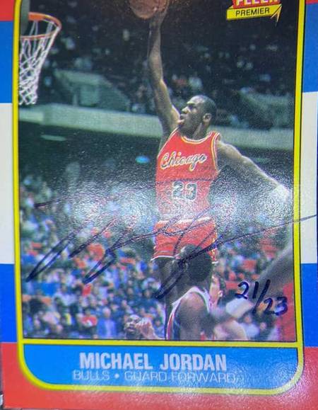 Michael Jordan rookie card buyback auto serial number 21/23 and additional image of the auto showing it is in fact blue ink