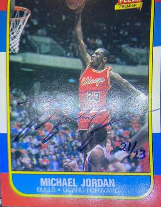 Michael Jordan rookie card buyback auto serial number 21/23 and additional image of the auto showing it is in fact blue ink