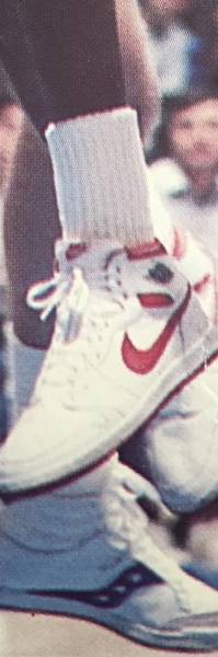 Close-up of the black Wings logo seen on the player exclusive White/Red Air Jordan 1s